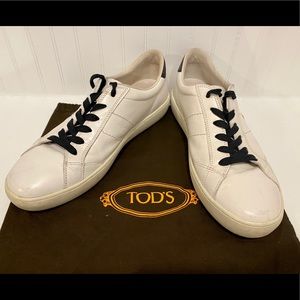 Tod’s white leather luxury low top sneaker.